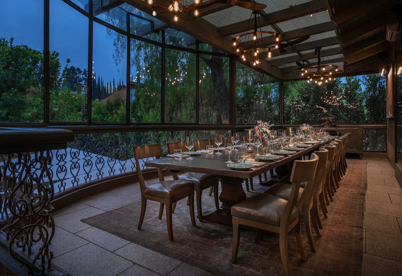 The candlelit garden conservatory dining room at Casa Lena in Woodland Hills